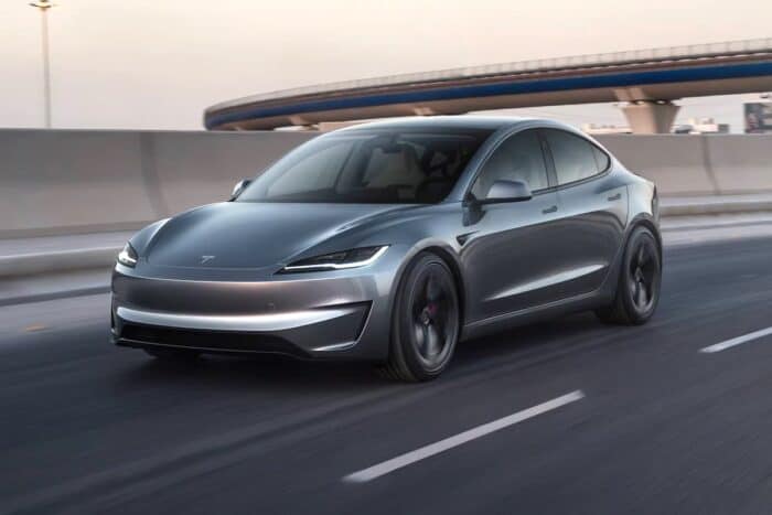 2026 Tesla Model 3 Long Range AWD front view driving on road