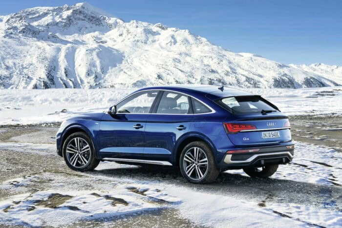 Blue Audi Q5 Sportback TFSI e quattro in the snow