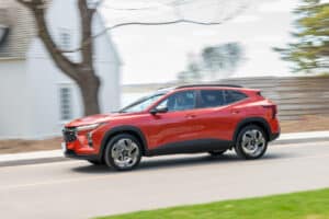 2024 Chevy Trax in orange driving