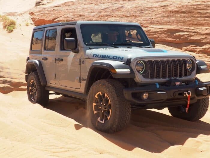 2024 Jeep Wrangler Rubicon in grey off roading in Utah