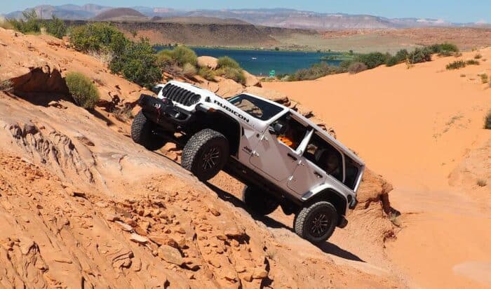 2024 Jeep Wrangler Rubicon rock climbing in white in Utah