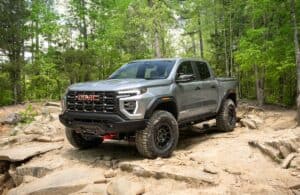 The 2024 Canyon AT4X AEV Edition front view off roading in the wild