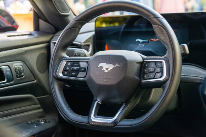 Redesigned flat bottom steering wheel inside the 2024 Mustang EcoBoost