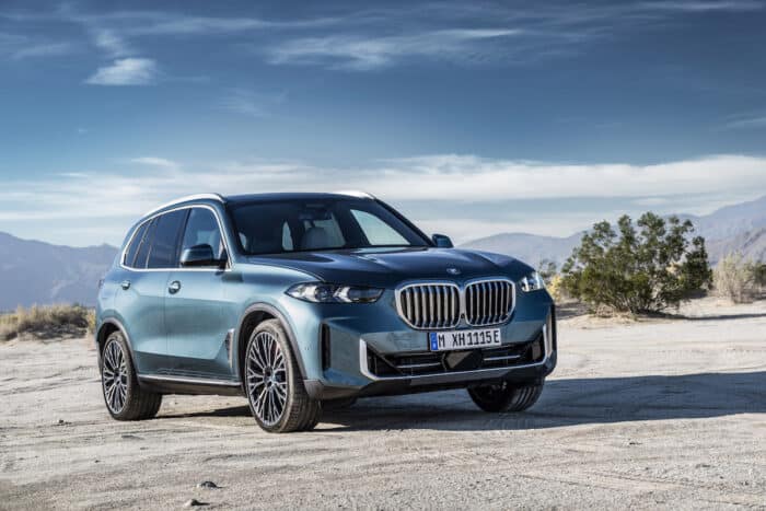 2024 BMW X5 front view parked outside on the road