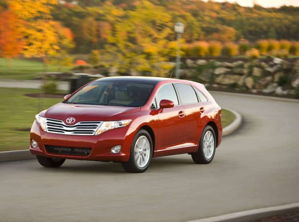 2010 Toyota Venza in red driving front view