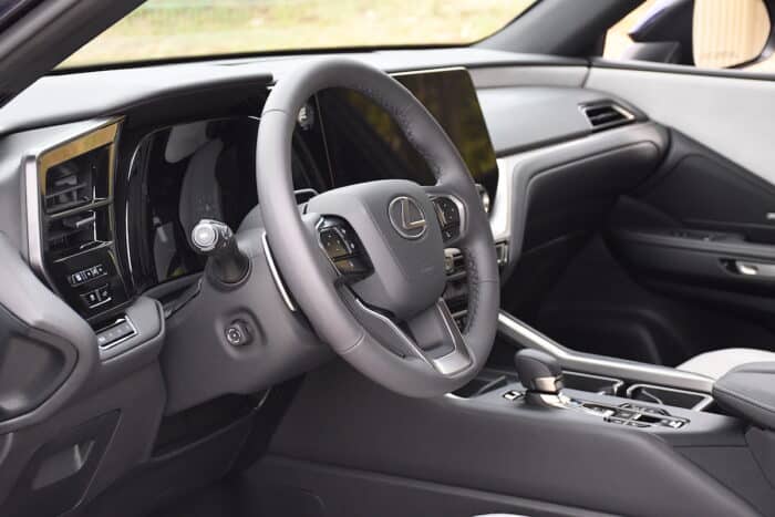 2024 Lexus TX F Sport interior from driver side with view of steering wheel