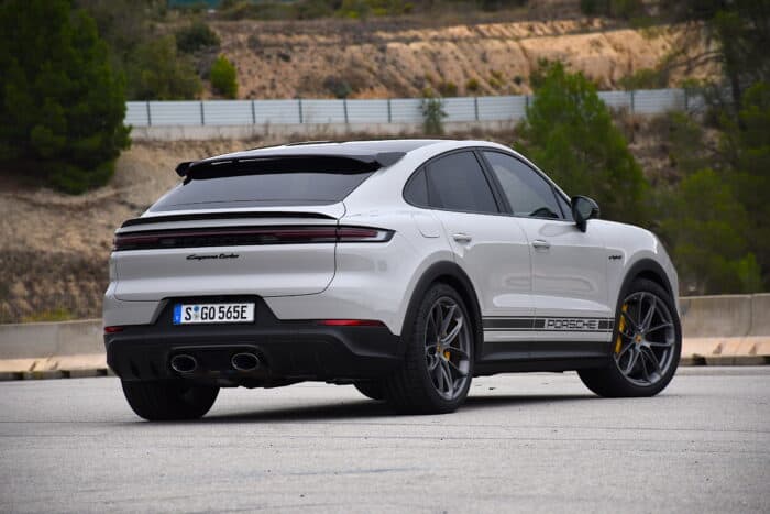 2024 Porsche Cayenne Turbo E Hybrid in white parked on the street rear view