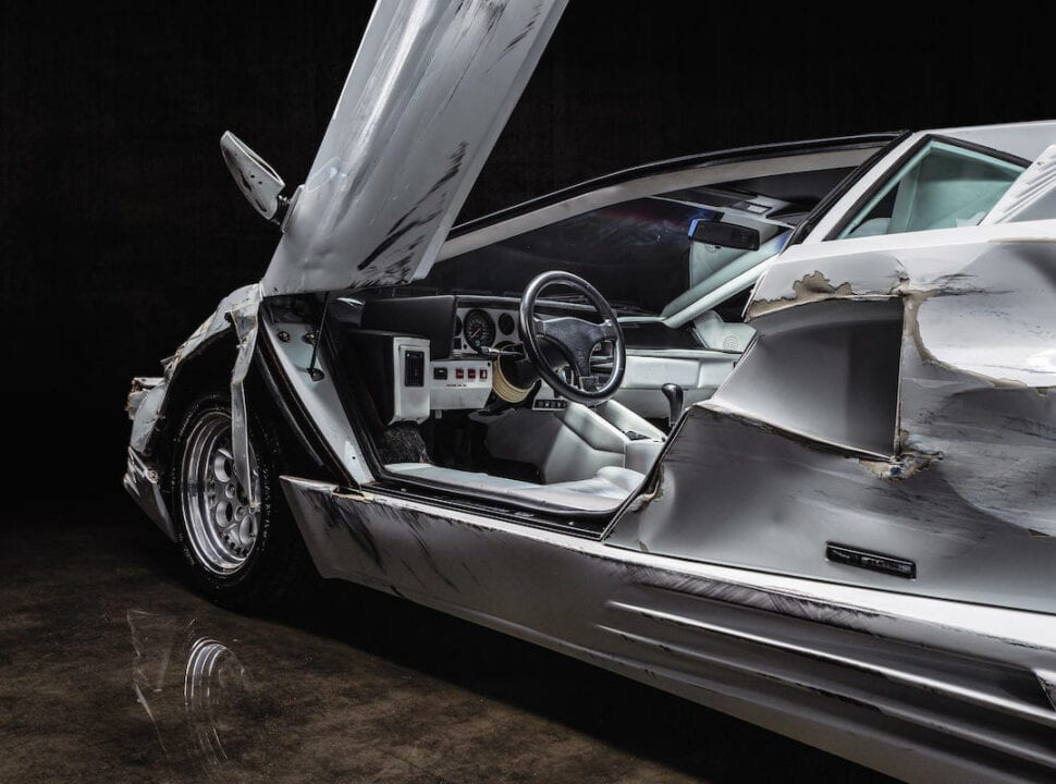 1989 Lamborghini Countach 25th Anniversary Coupé from Wolf of Wall Street driver side with door up