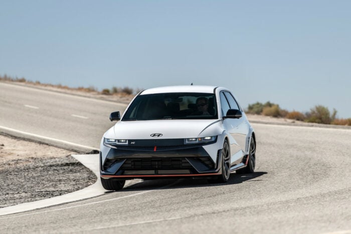 2024 Hyundai IONIQ 5 N front view driving on track around a corner