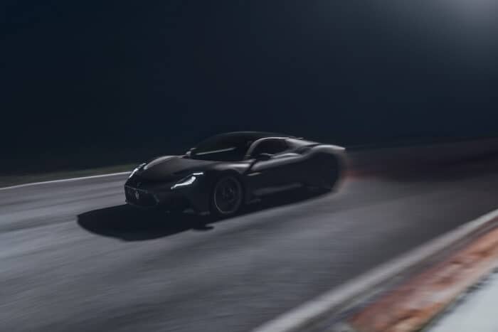 Maserati MC20 Notte Edition driving fast at night