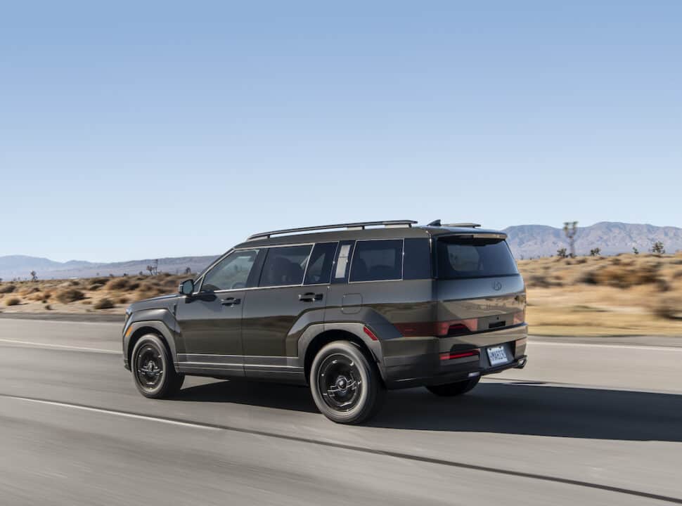 2024 Hyundai Santa Fe XRT rear view driving fast on the road