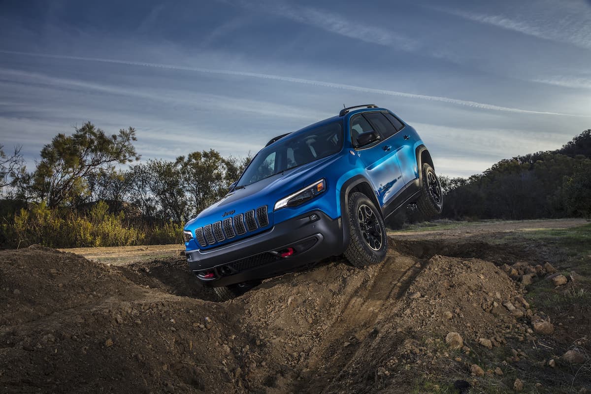 blue 2023 Jeep Cherokee Trailhawk off roading