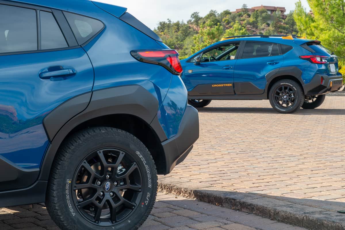 2024 Subaru Crosstrek Wilderness side by side rear view in blue