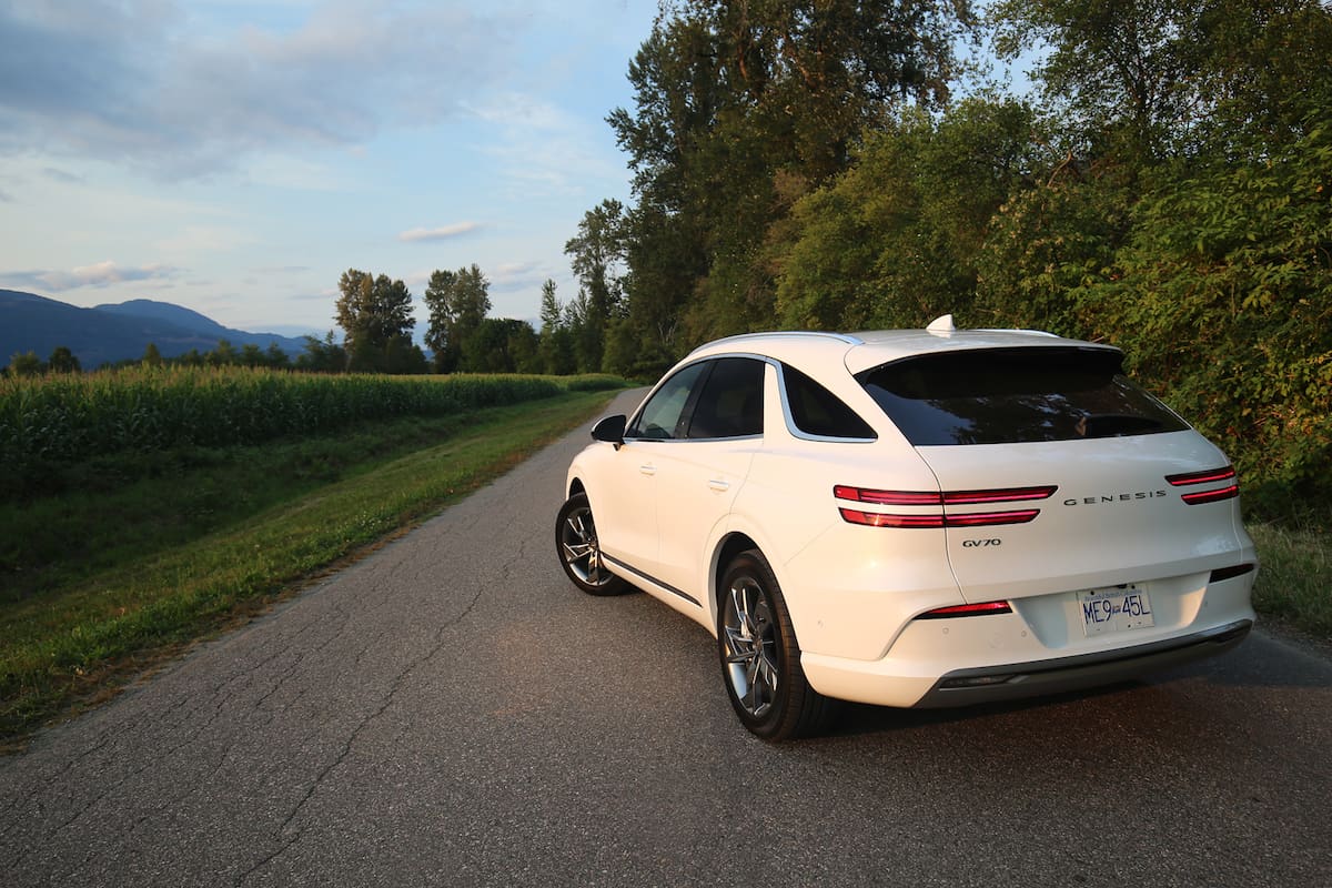 2023 Genesis Electrified GV70 Prestige AWD rear profile parked on road