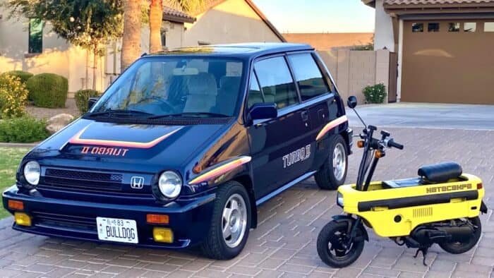 1983 Honda City Turbo II with motorcompo both parked on garage driveway