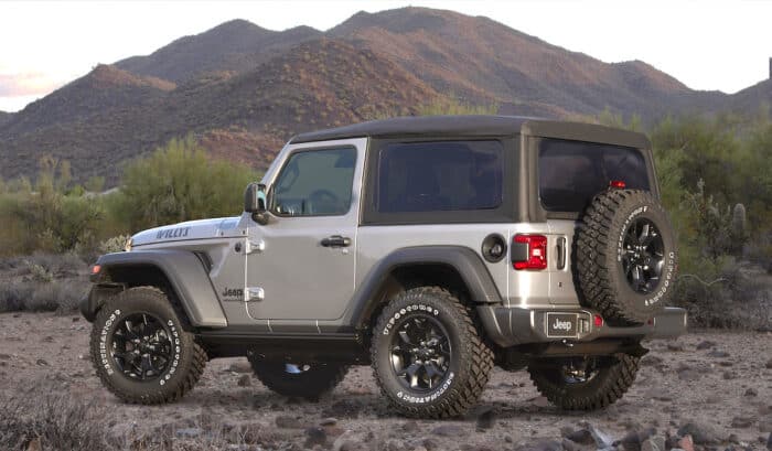 Silver 2020 Wrangler Willys Edition rear view parked on dirt road