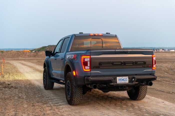 2023 Ford F-150 Raptor R rear shot parked on dirt at sunset