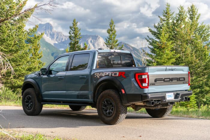 2023 Ford F-150 Raptor R rear view parked on road in mountains