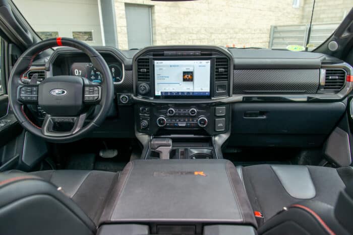 2023 Ford F-150 Raptor R interior front cabin wide view from 2nd row