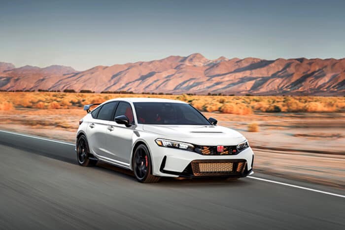 White 2023 Honda Civic Type R (FL5) driving in the desert on the road