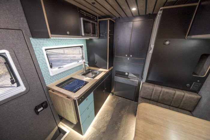 The Wilderness Vans 2023 F-550 Overlander Camper interior and kitchen