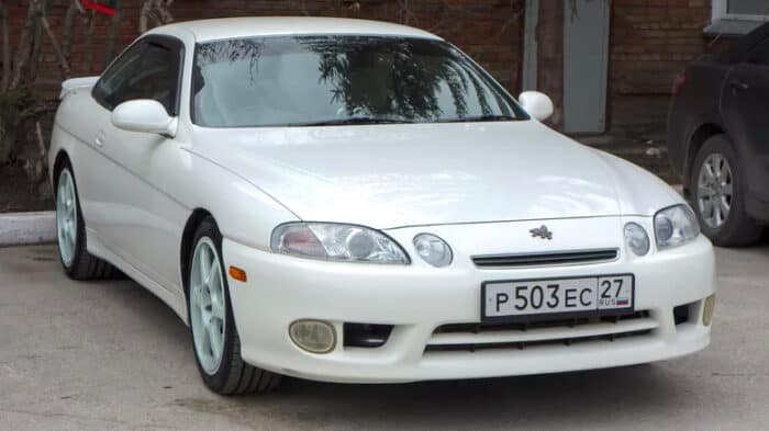 white Toyota Soarer parked front view