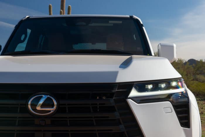 White 2024 Lexus GX 550 Luxury+ AWD front headlight and grill up close