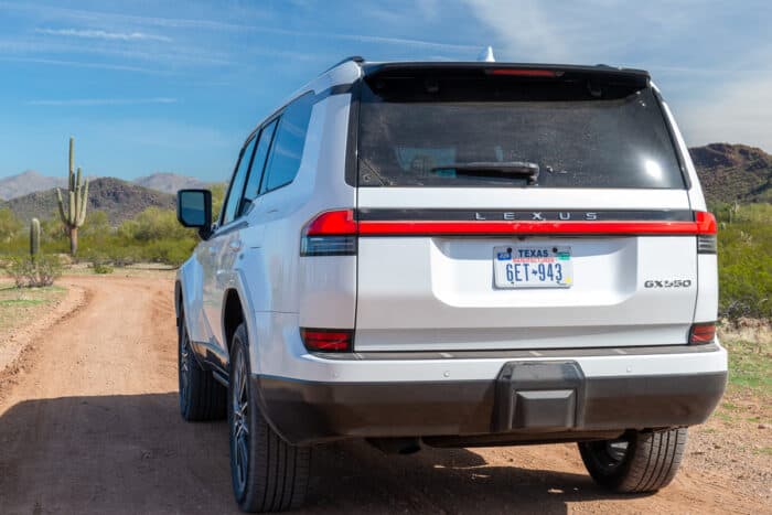 White 2024 Lexus GX 550 Luxury+ AWD rear view in the desert