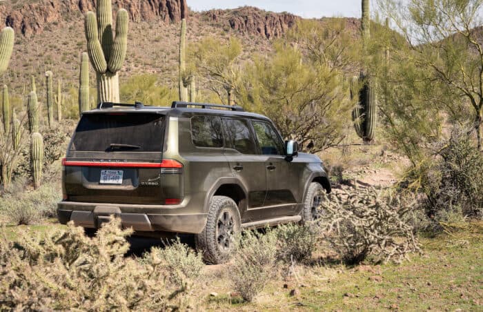 2024 Lexus GX 550 Overtrail rear view in the desert with cactus