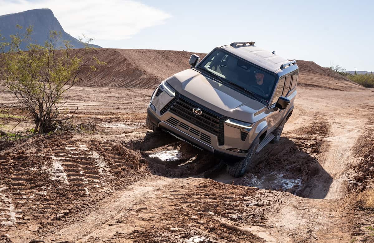 2024 Lexus GX 550 Overtrail front view off roading in dirt