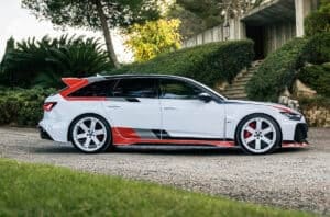 Audi RS 6 Avant GT side view parked on driveway in front of home