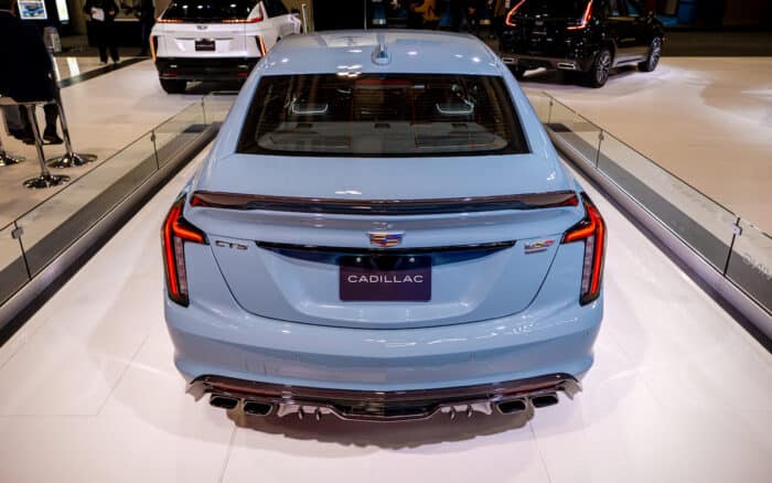 2025 Cadillac CT5-V Blackwing rear head on at global debut on stage