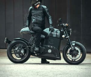 Rider sitting on the Savic C Series EV Bike