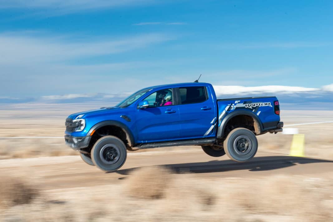 Blue 2024 Ford Ranger Raptor jumping through the air