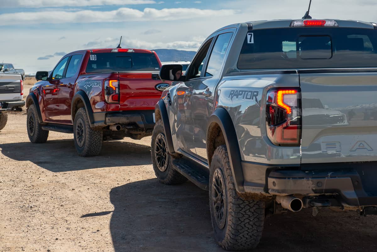 2024 Ford Ranger Raptor rear view of trucks with taillights on