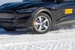 Continental UltimateContact Winter Tire on black Mach-E in the snow