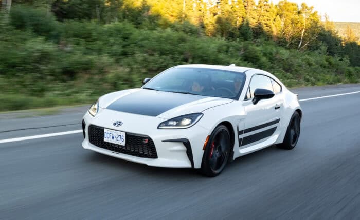 Toyota GR86 Trueno Edition black and white driving on the road