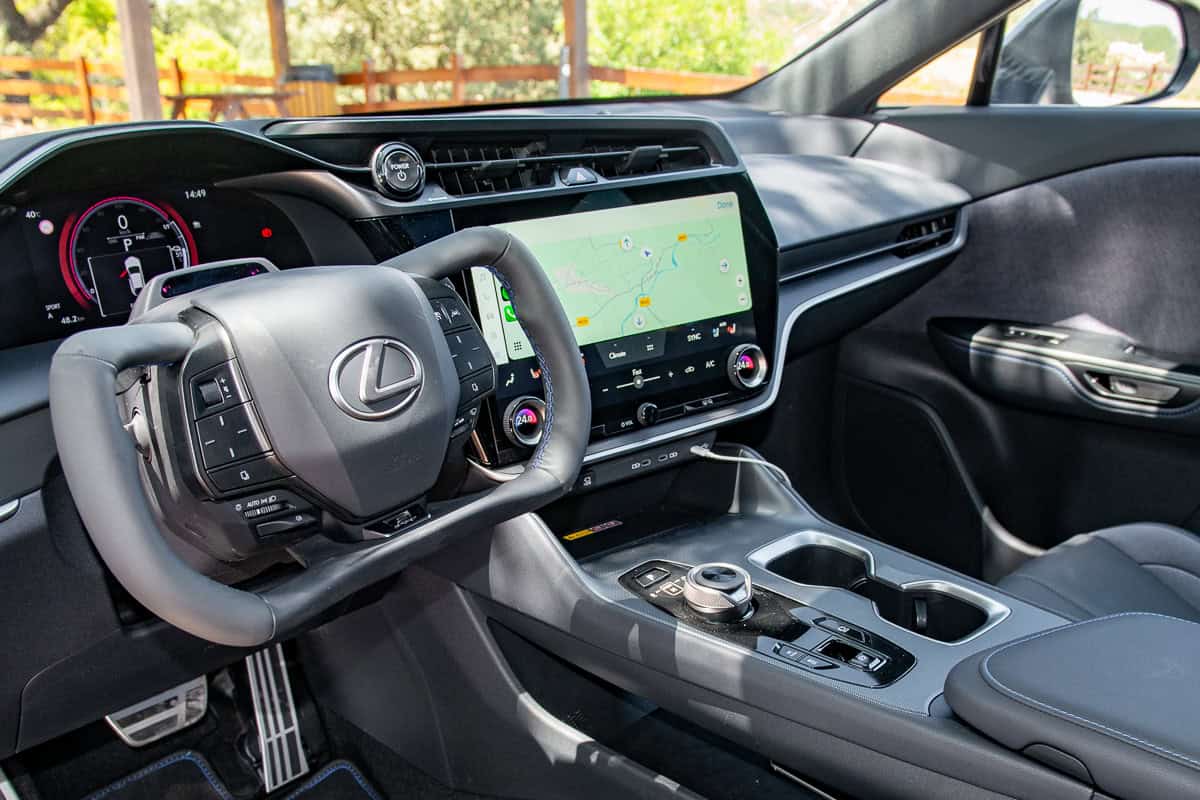 2026 Lexus RZ 550e F SPORT interior with yoke steering wheel