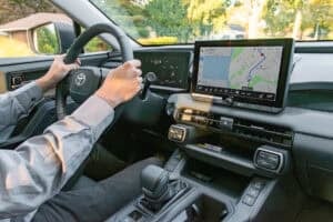 2026 Toyota RAV4 XLE Hybrid interior front while driving