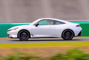 2026 Honda Prelude side view driving fast at Japanese track