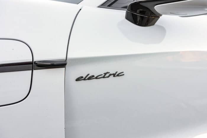 2026 Porsche Taycan GTS Sport Turismo 'electric' emblem on side of car