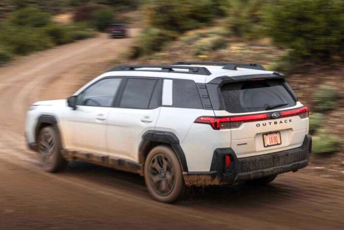 2026 Subaru Outback white rear drivng