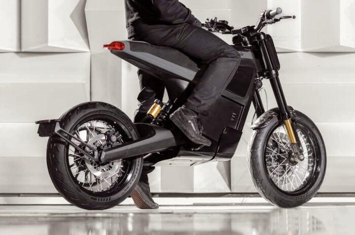 DAB 1α Electric Motorcycle with rider rear