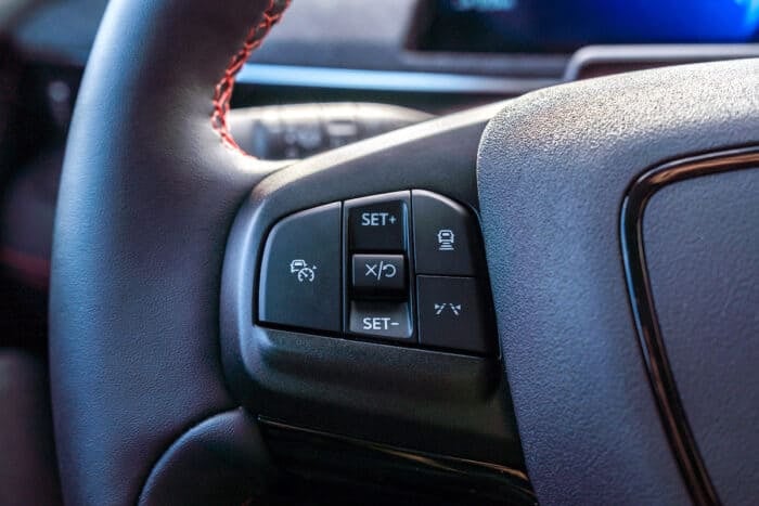 2025 Ford Mustang Mach-E Premium bluecruise setting on steering wheel