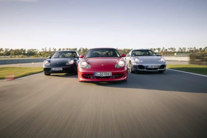 Three Porsche 996 driving together on the track