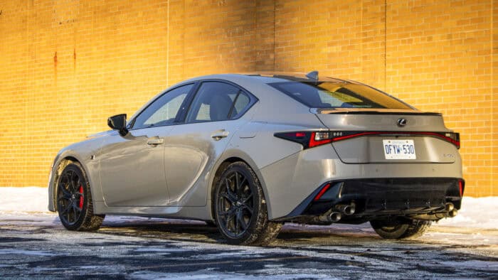 Grey 2025 Lexus IS 500 rear view parked in snowy parking lot
