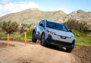 2026 Subaru Uncharted EV SUV front view off roading course