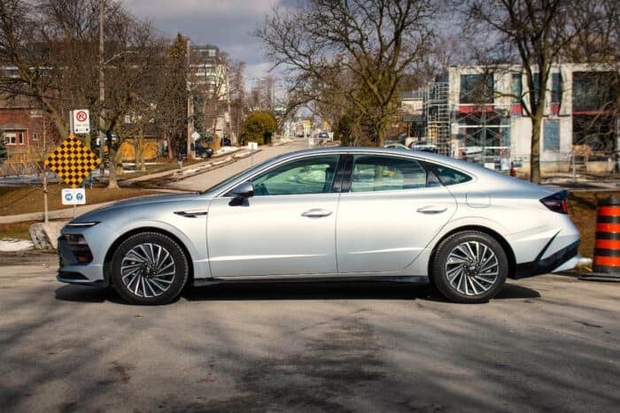 2026 Hyundai Sonata Hybrid side view parked on street