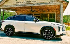 White 2027 Infiniti QX65 side view