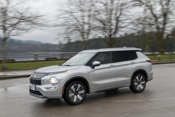 2026 Mitsubishi Outlander PHEV front driving fast